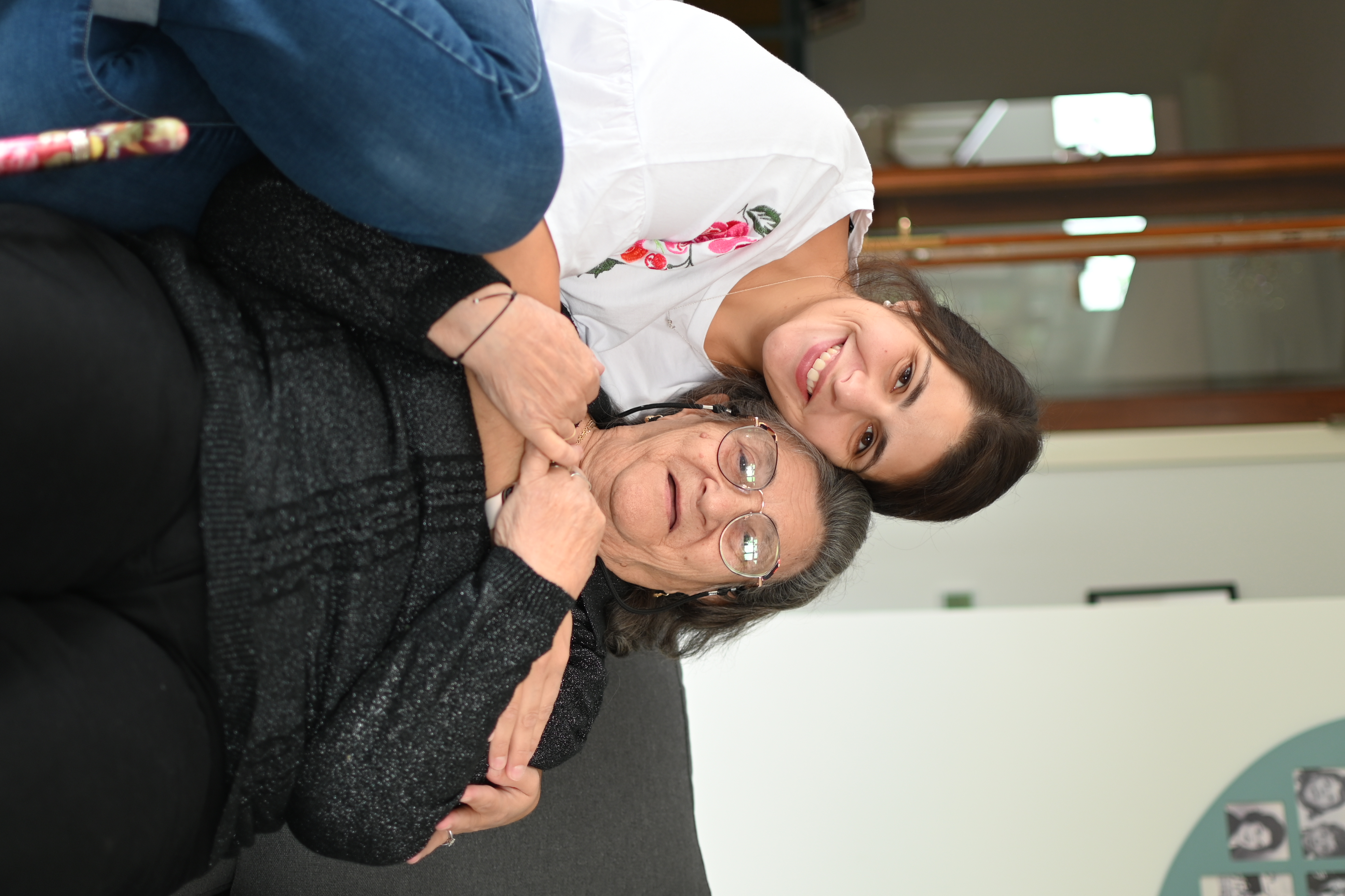 Carer sharing a warm moment with client